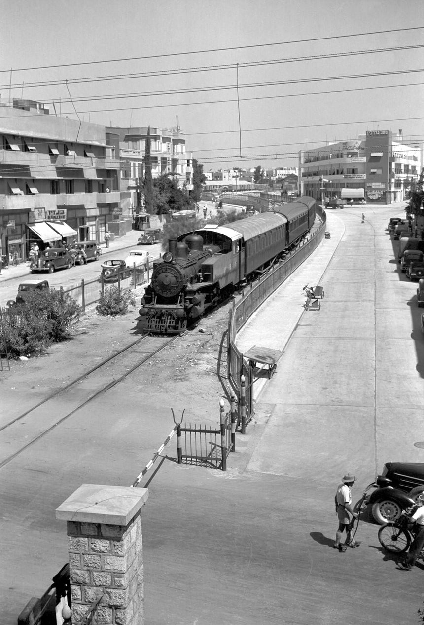 A Train from Jerusalem to Tel-Aviv Crossing Allenby St.