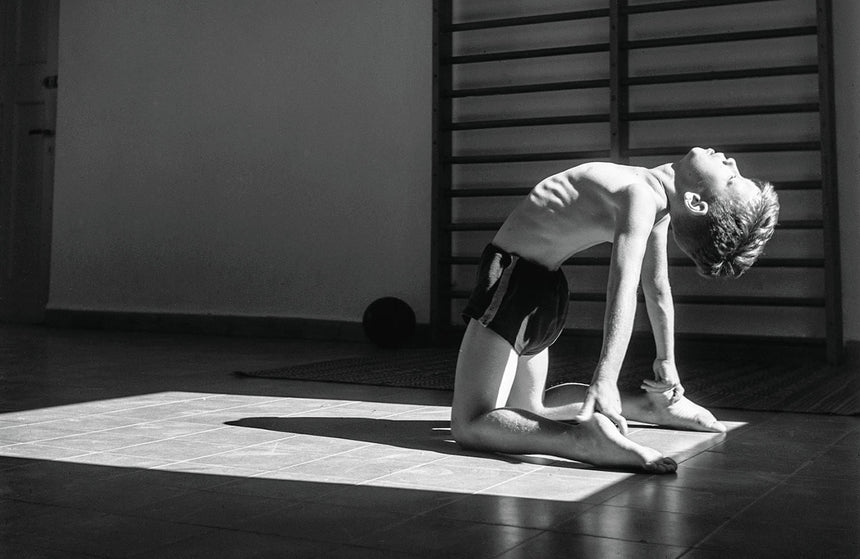 A boy exercising at the Edith Reiner Gymnastics School