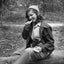 Girl with Matza and a Pistol